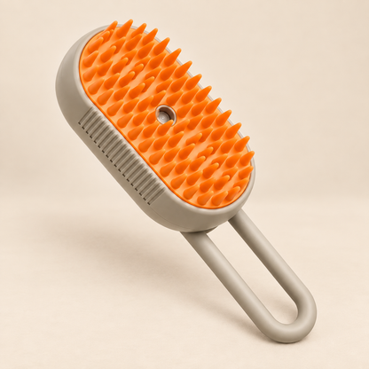 MistGlow 3-in-1 Pet Grooming Brush orange on warm beige background